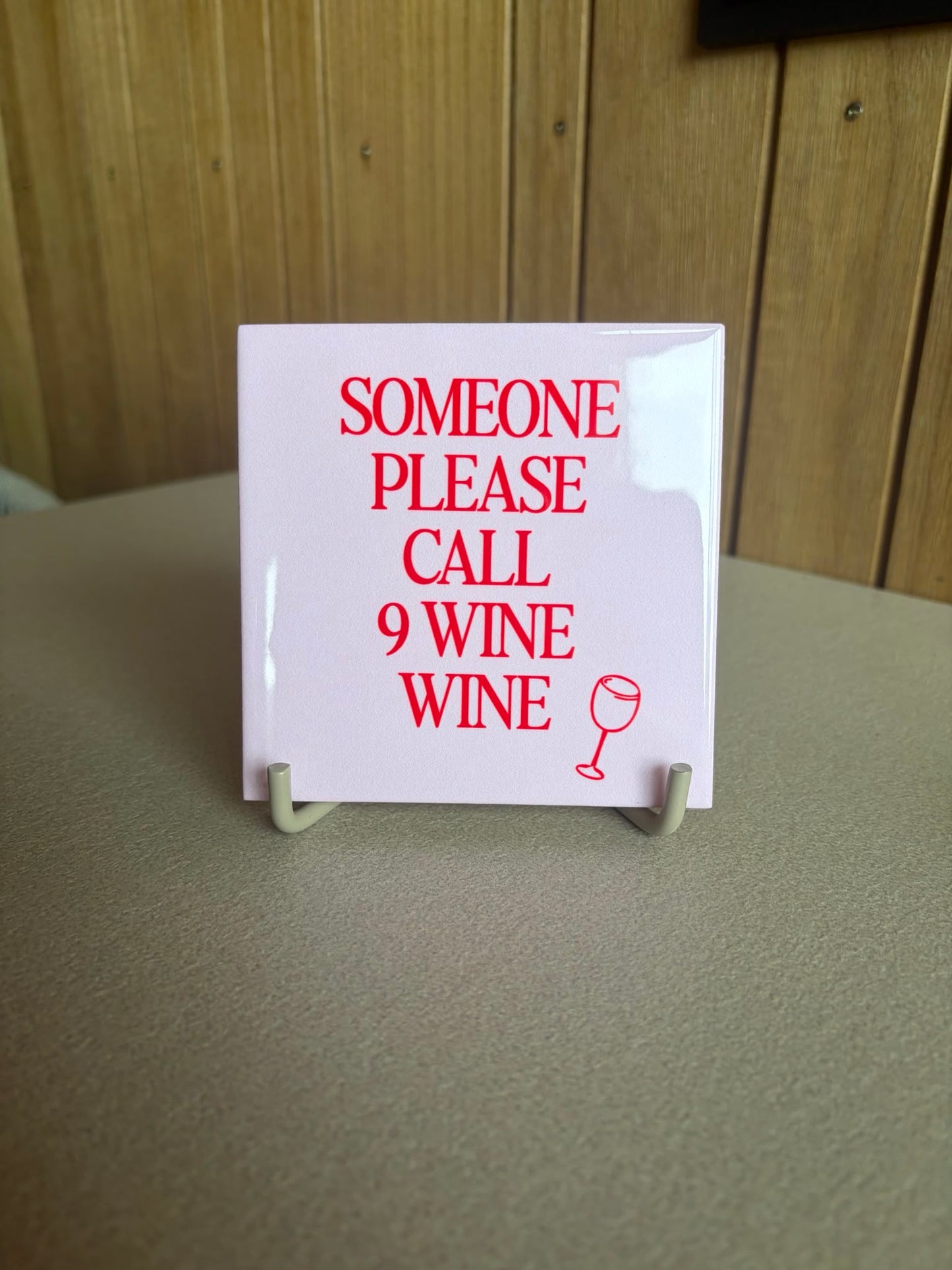 Tegeltje - someone please call nine wine wine